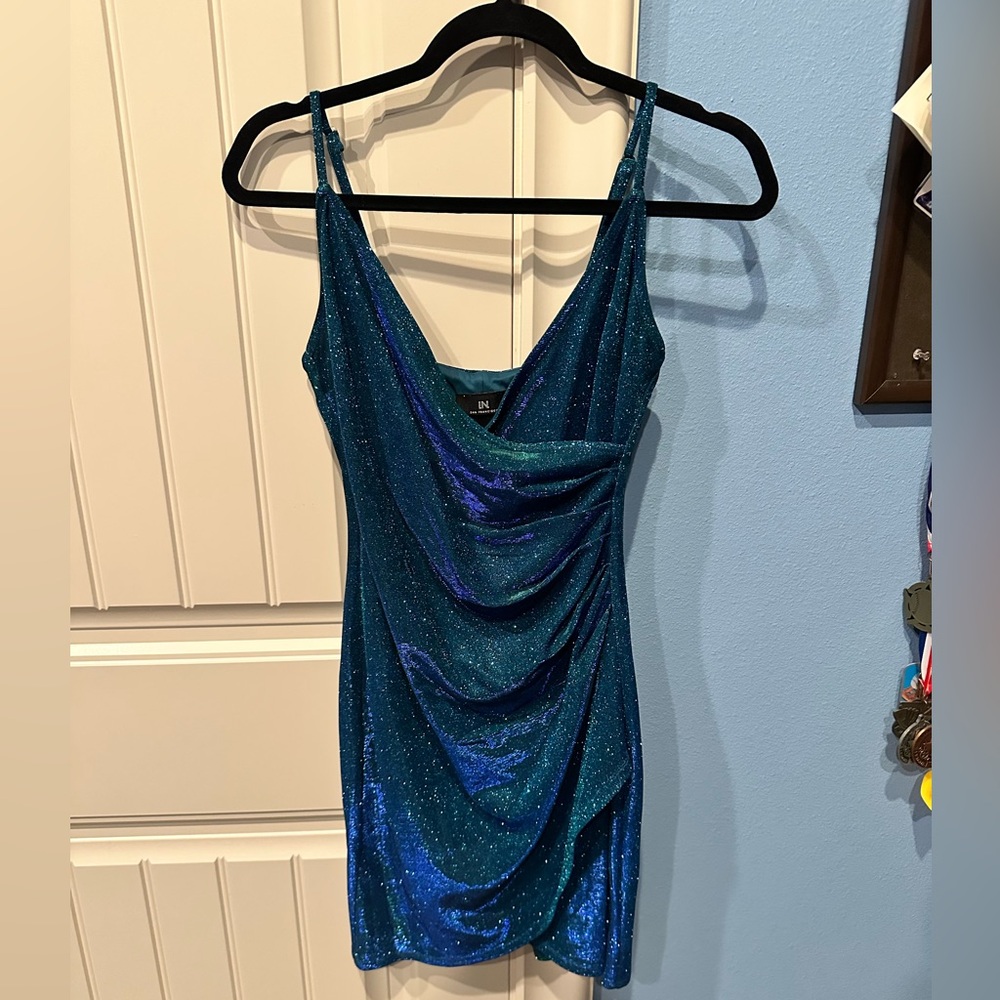 Glittery blue/green size small party dress